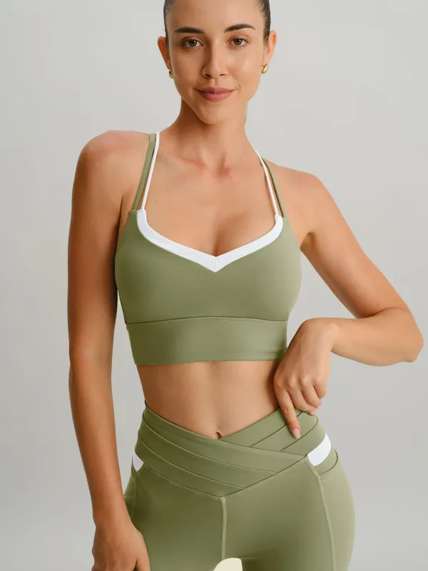 Green Contrast X Cross Sports Bra sold by BERLOOK