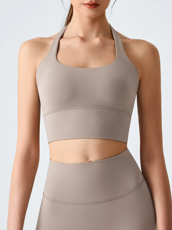 Apricot Halter Twist Back Sports Bra sold by BERLOOK