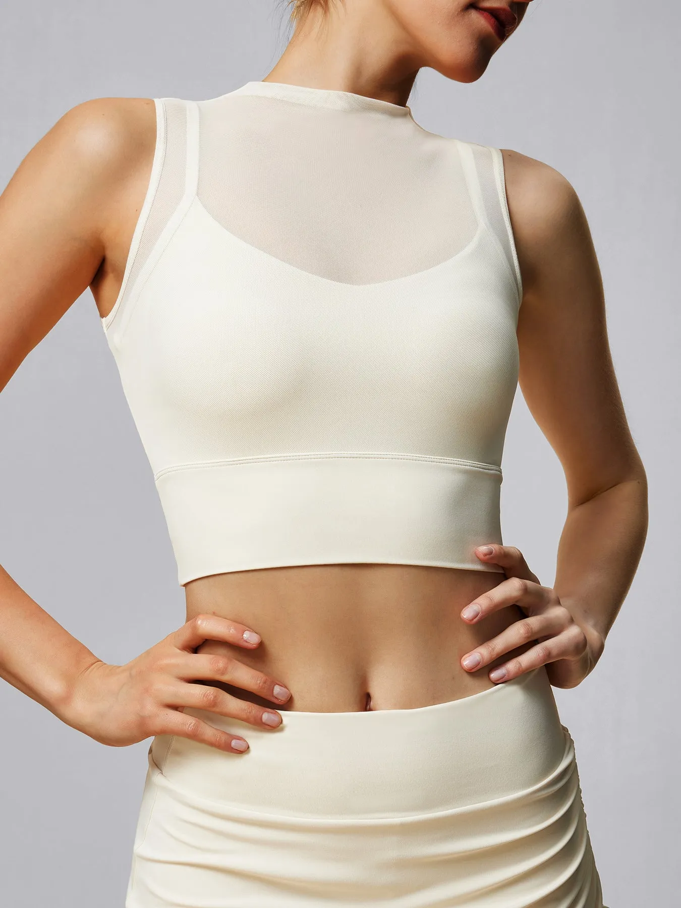 Cream Mesh Panel Mock Neck Tank Top sold by BERLOOK