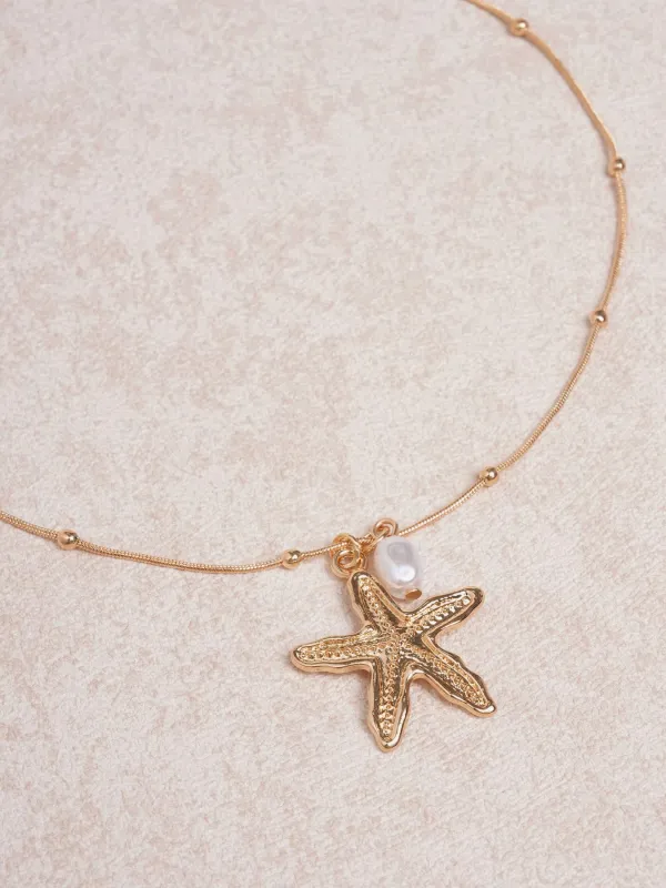 Gold-Tone Starfish Necklace sold by BERLOOK