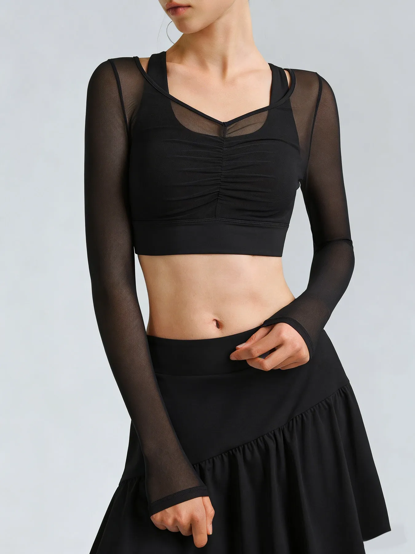 Black Mesh Ruched Crop Long Sleeve Top sold by BERLOOK