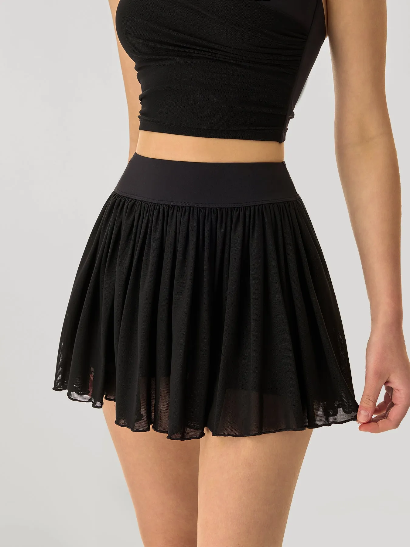 Black Mesh Sports Skirt sold by BERLOOK