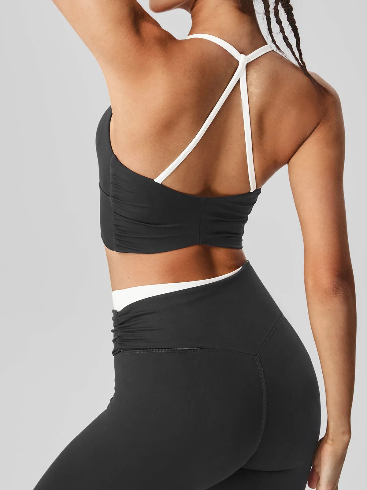 Black Halter Sports Bra - Light Support sold by BERLOOK