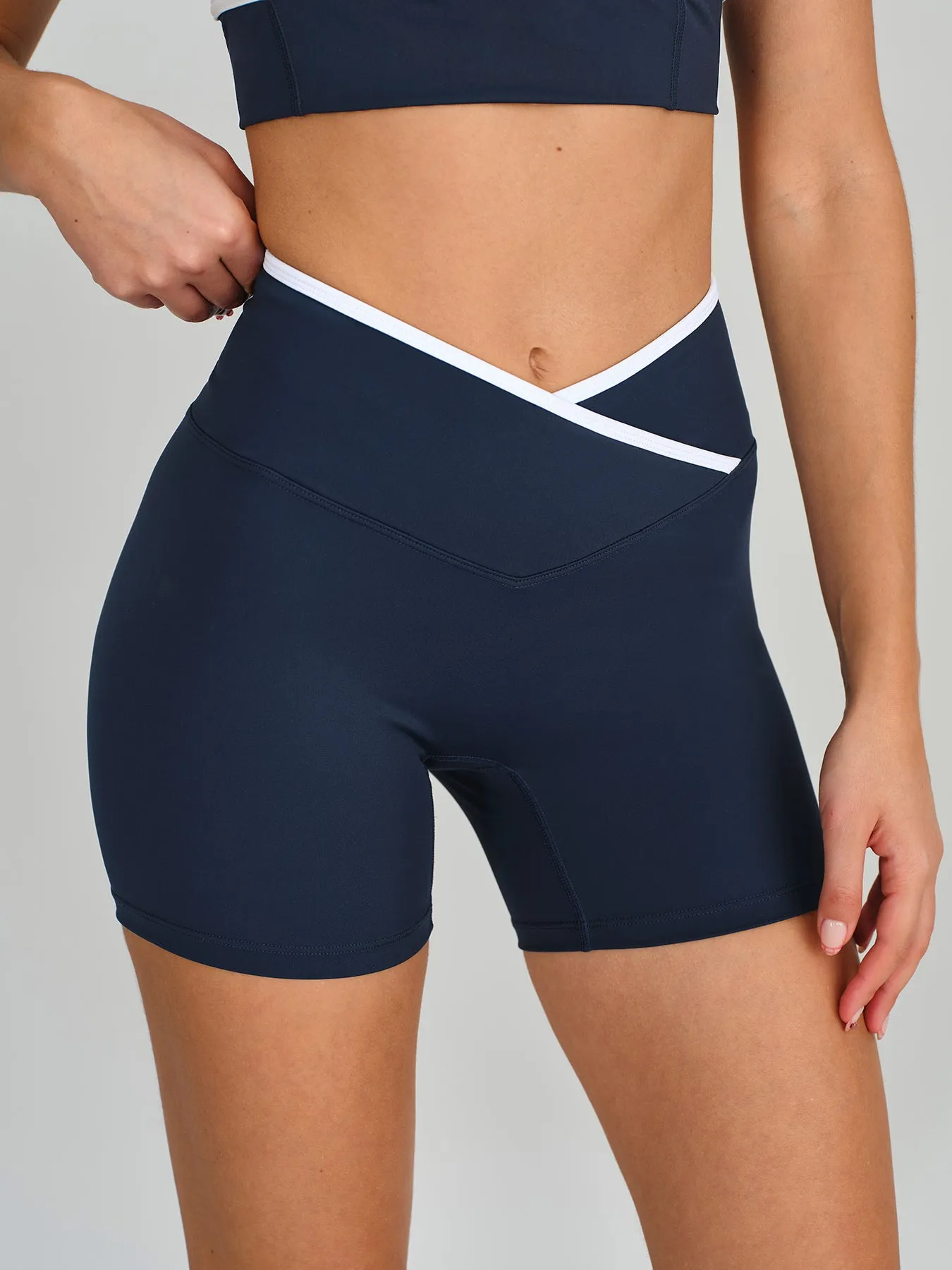 Navy Contrast Front-Cross Sports Shorts sold by BERLOOK