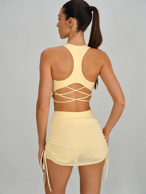 Light Yellow Crisscross Tie Back Sports Bra - Light Support made by BERLOOK