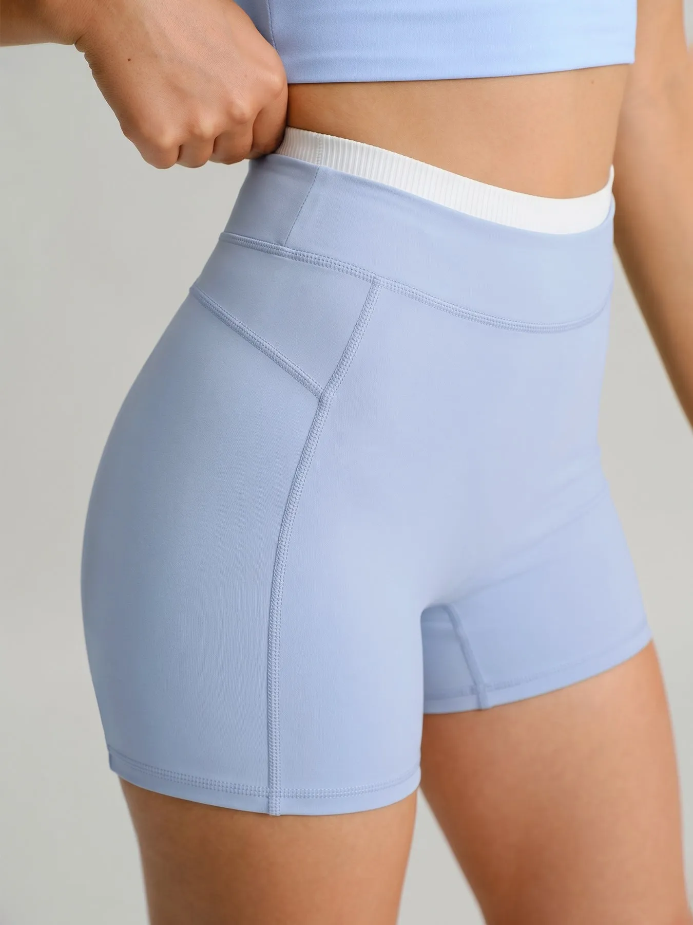 Light Blue High-Waist Contrast Shorts 4" sold by BERLOOK