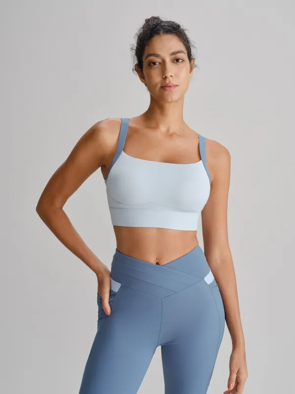 Blue Contrast Strap X Cross Sports Bra made by BERLOOK