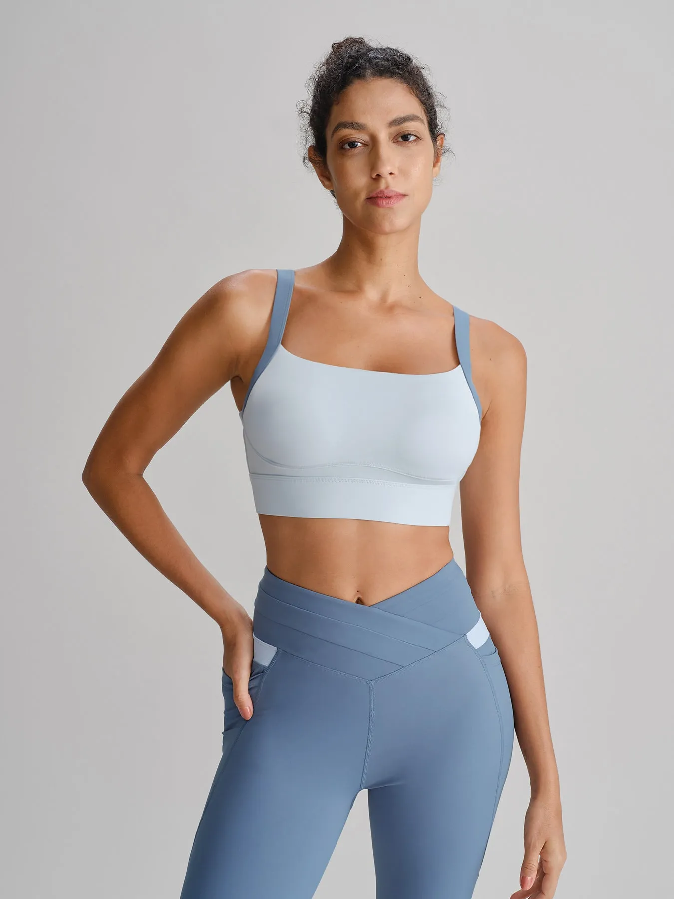 Blue Contrast Strap X Cross Sports Bra sold by BERLOOK