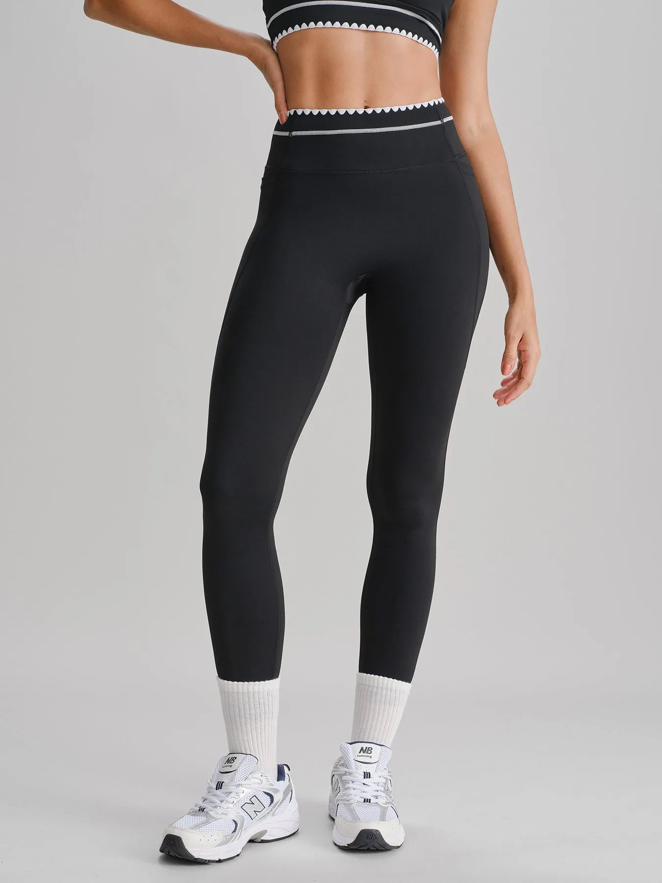 Black High Waisted Contrast Trim Leggings 25" sold by BERLOOK