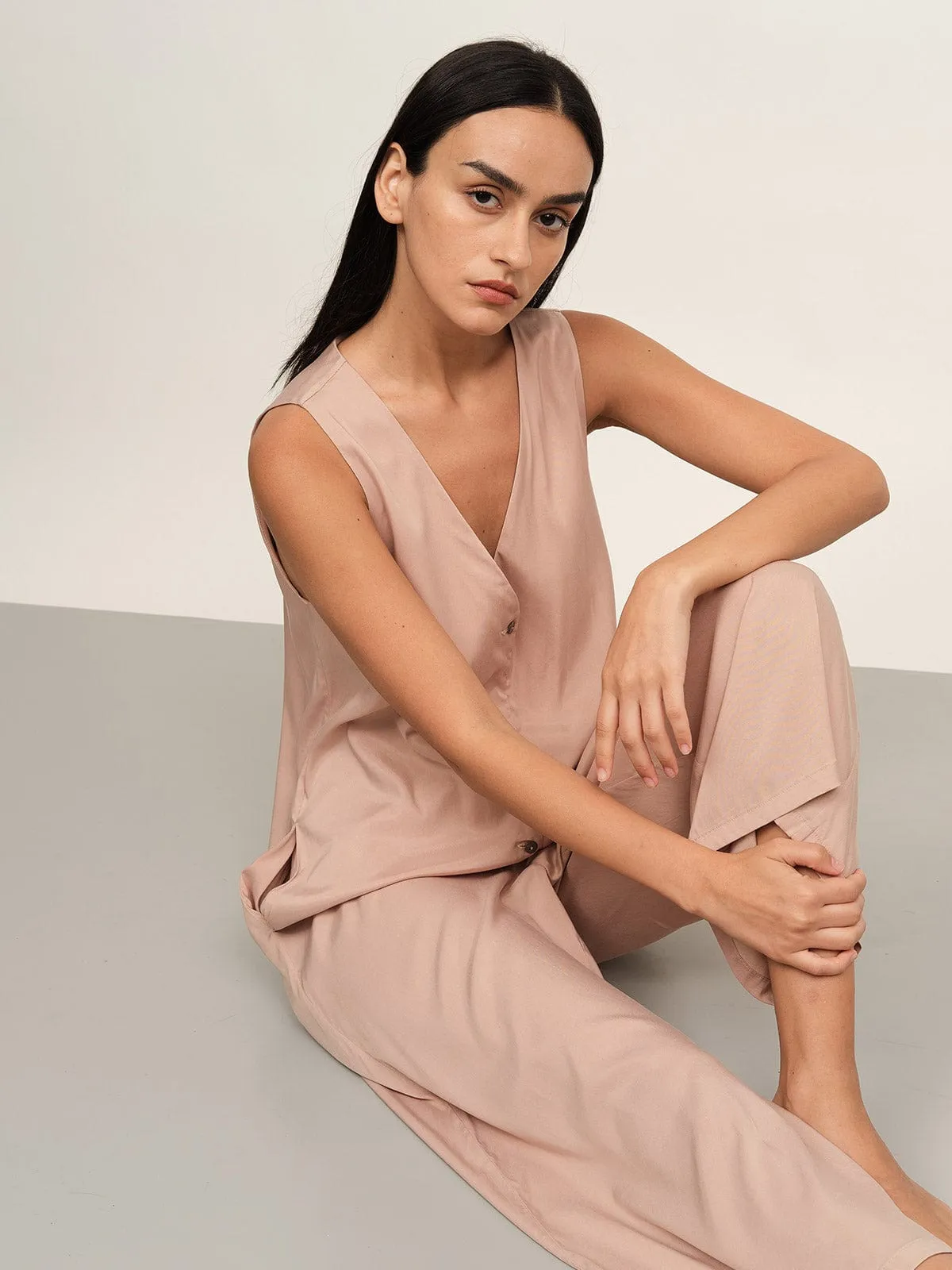 Button Up Solid Jumpsuit sold by BERLOOK