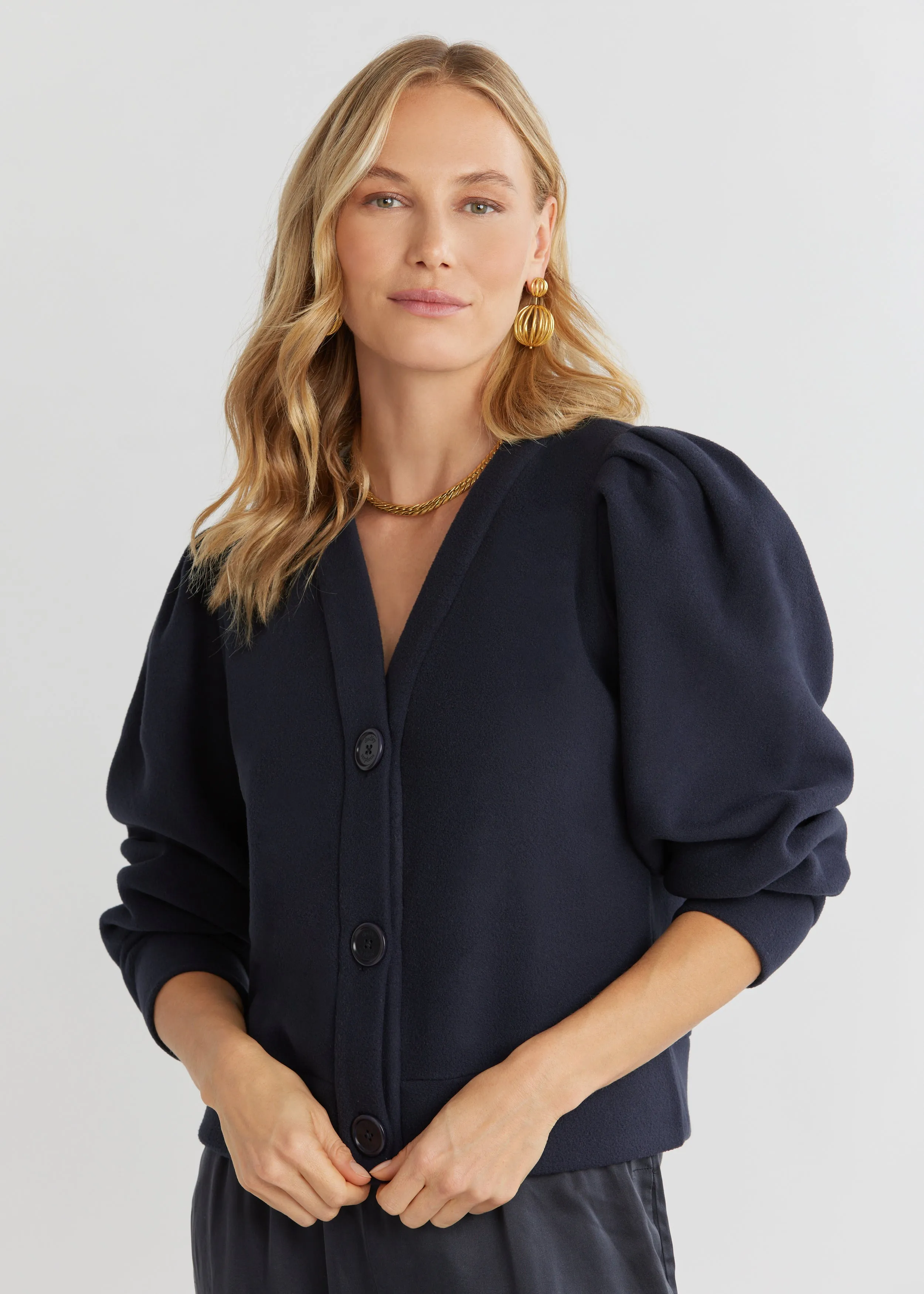 Kelly Puff Sleeve Cardigan in Vello Fleece (Navy) sold by Dudley Stephens