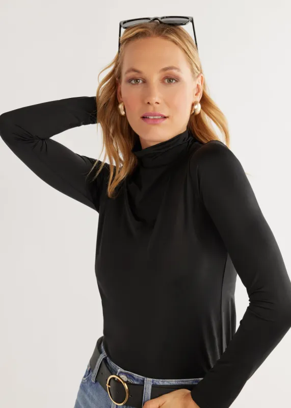 Tillary Turtleneck in Eco Stretch (Black) sold by Dudley Stephens
