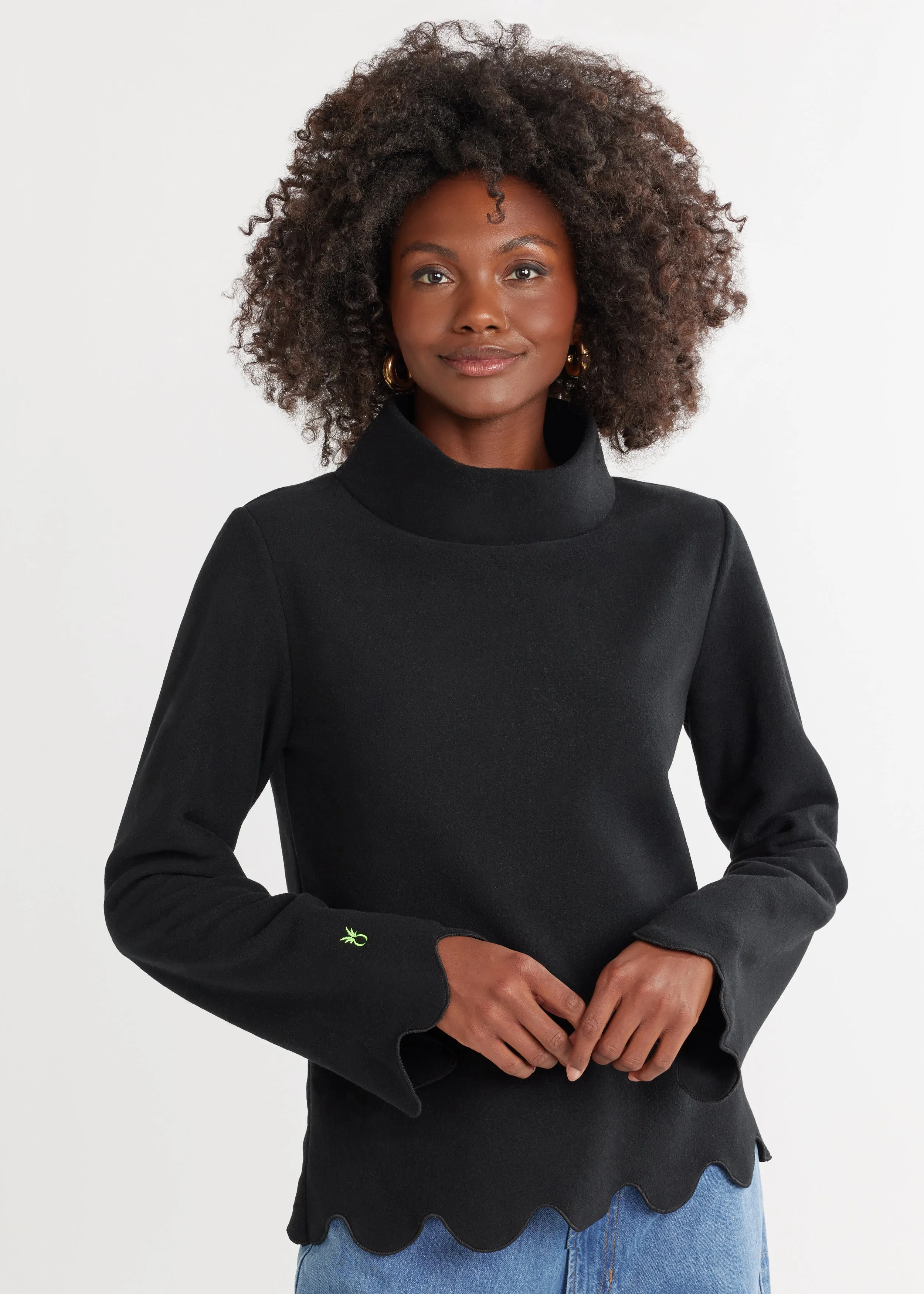 Sutton Scallop Turtleneck in Vello Fleece (Black) sold by Dudley Stephens