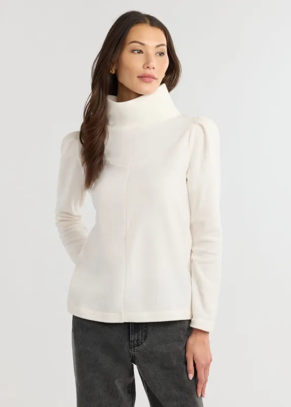 Camilla Puff Sleeve Turtleneck in Vello Fleece (Cream) sold by Dudley Stephens