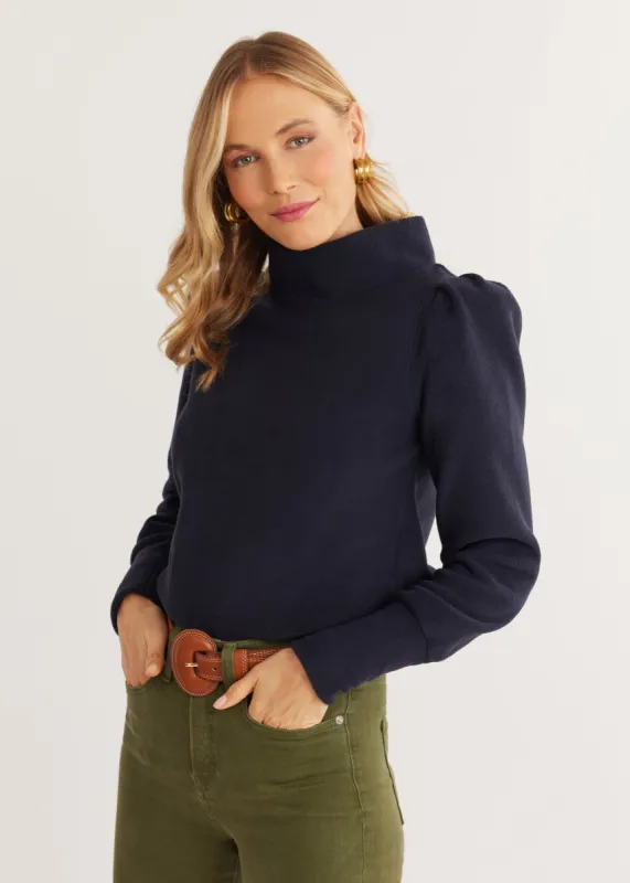 Palace Puff Sleeve Turtleneck in Vello Fleece (Navy) sold by Dudley Stephens