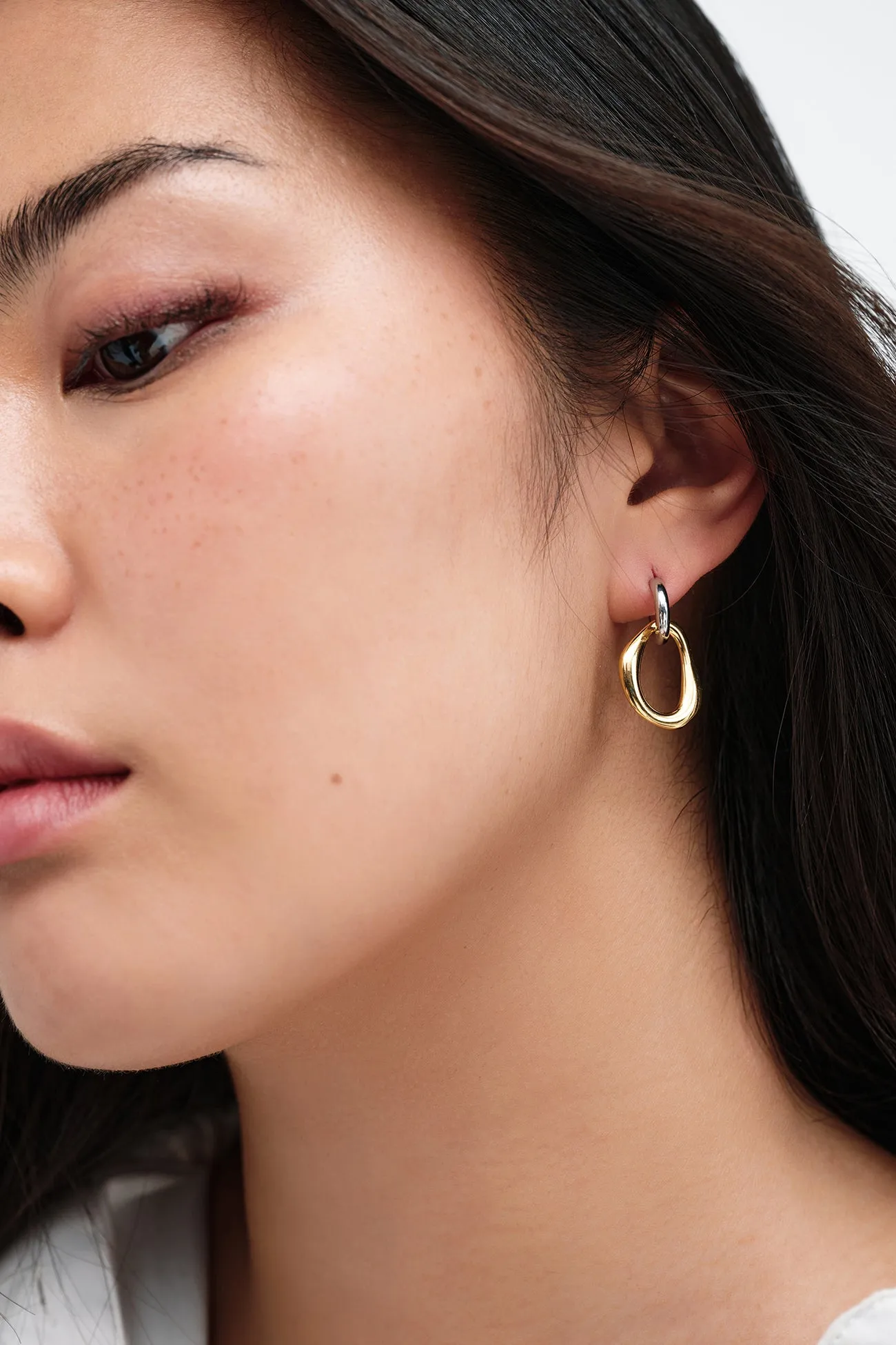 Suki Two-Toned Hoops sold by Marcella NYC