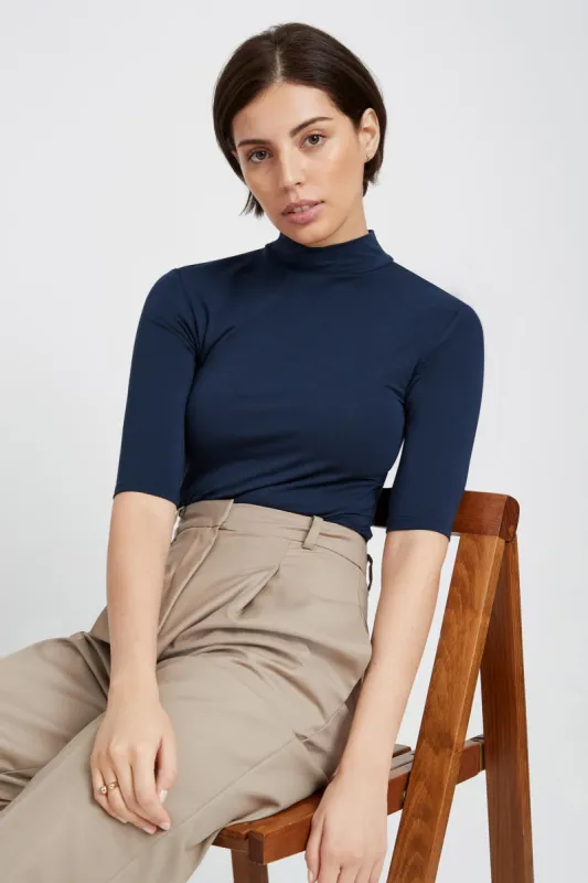 Ana Mock Neck Top sold by Marcella NYC