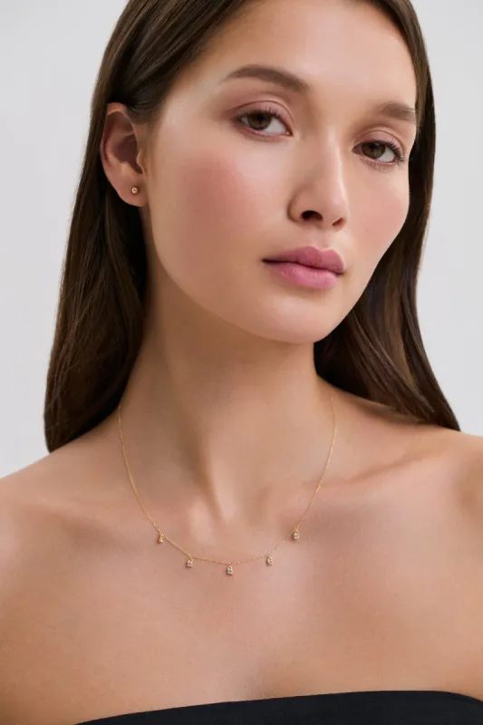 14k Gold Sparks Dangle Necklace sold by Marcella NYC