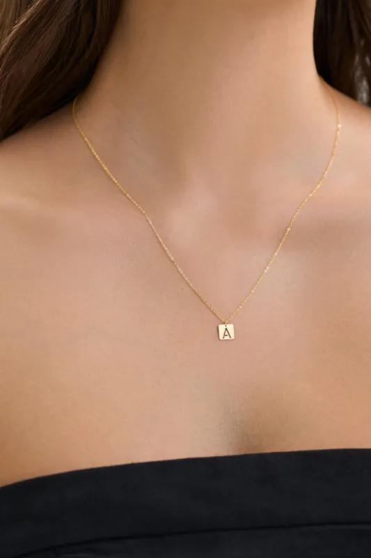 14k Gold Initial Tile Necklace sold by Marcella NYC