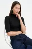 Ana Mock Neck Top sold by Marcella NYC