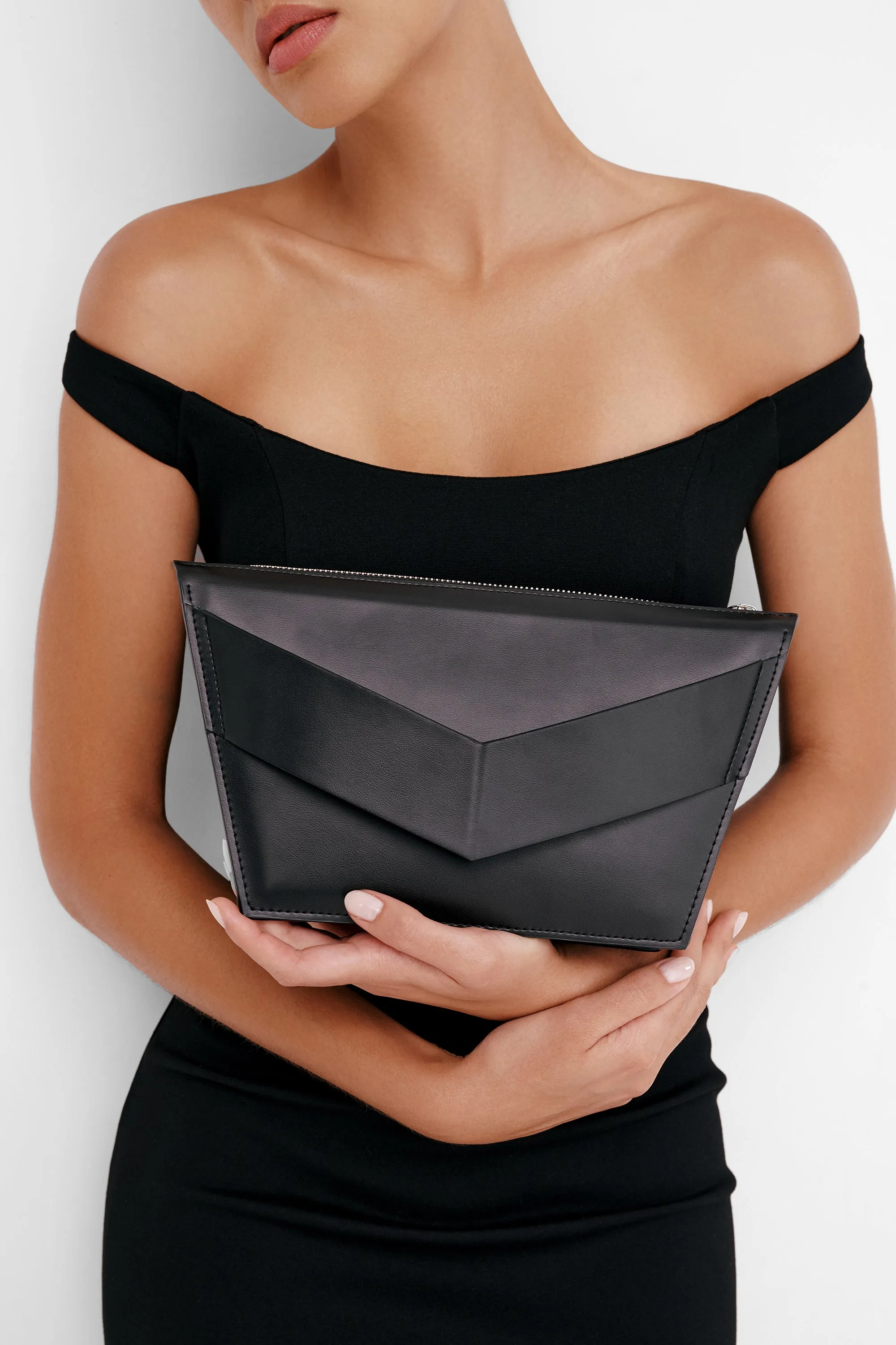 Jay Convertible Clutch sold by Marcella NYC
