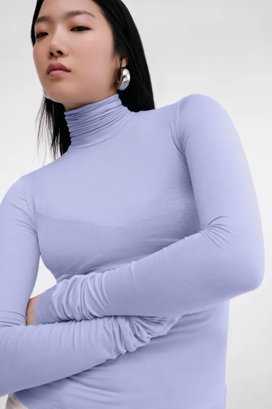 Eloise Sheer Turtleneck sold by Marcella NYC