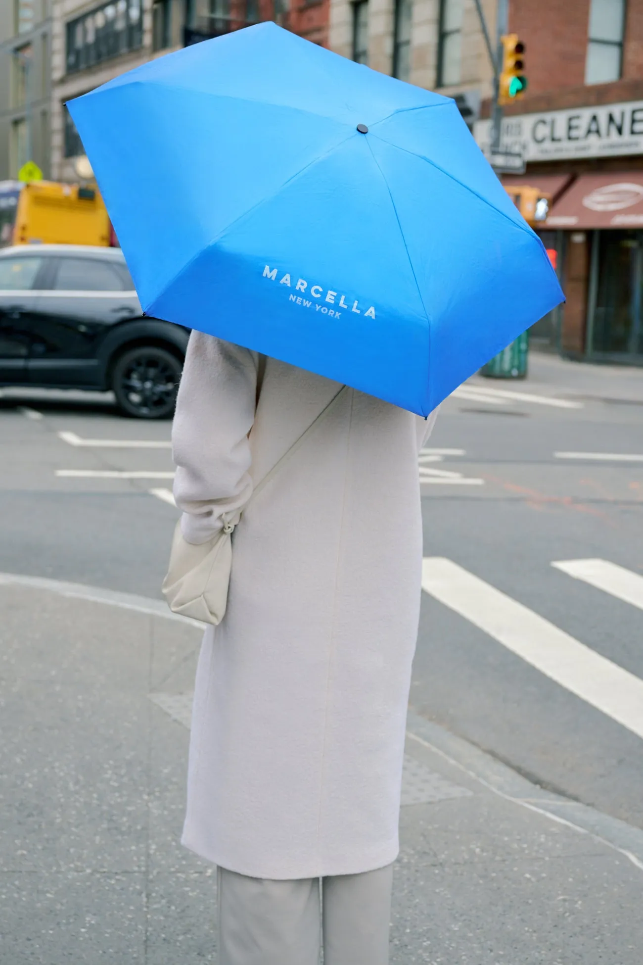 Branded Compact Umbrella sold by Marcella NYC