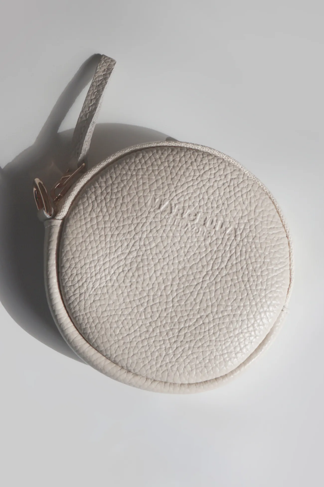 Glow Club Free Gift — Maiya Circle Pouch sold by Marcella NYC