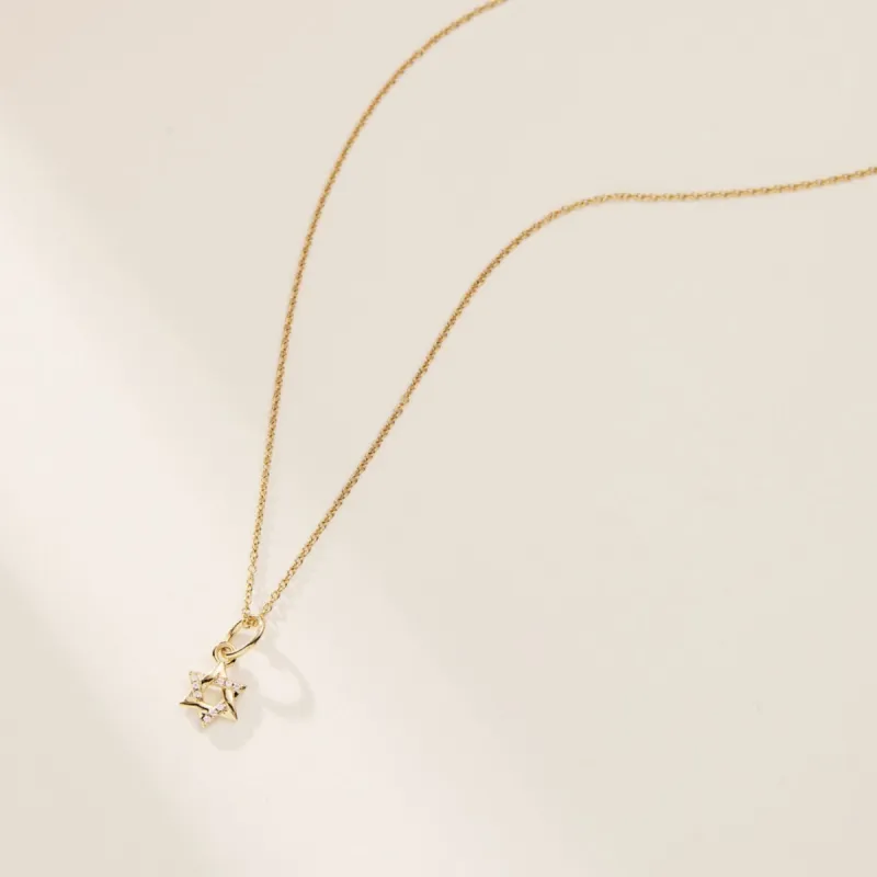 14k Gold Star of David Charm sold by Tiny Tags