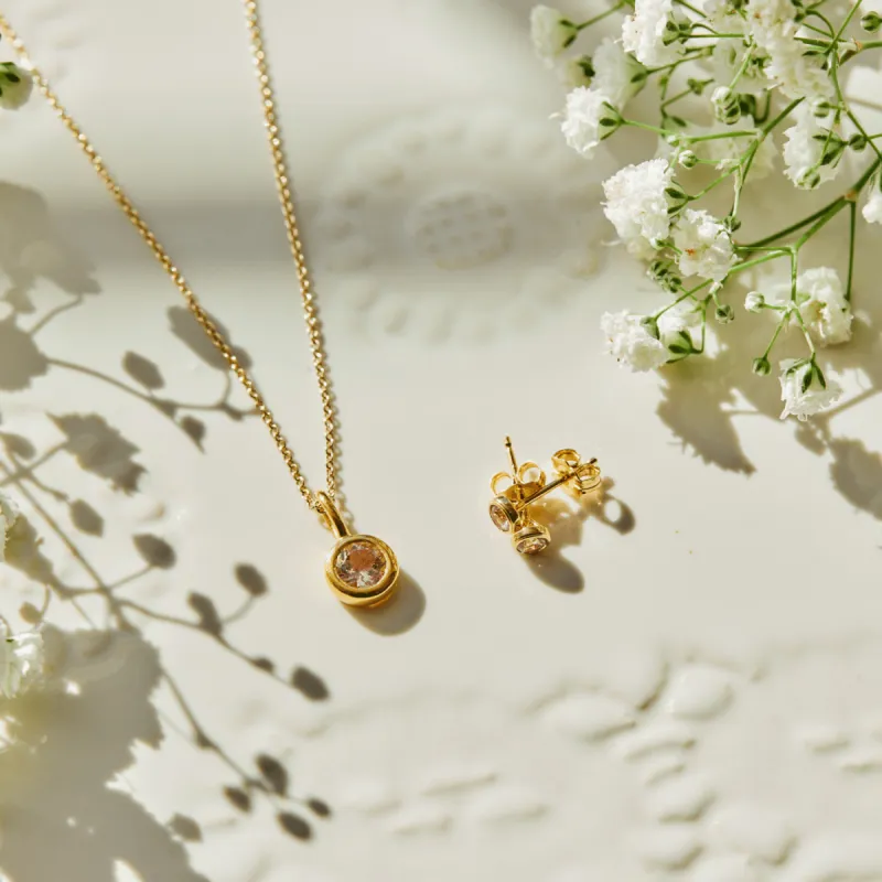 Gold Birthstone Bundle (Necklace + Earrings) sold by Tiny Tags