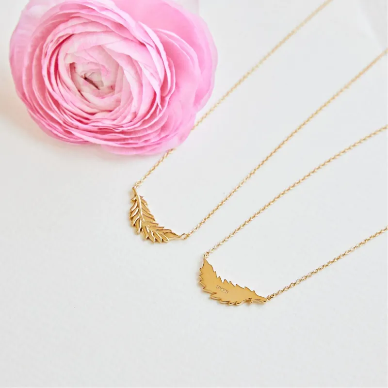 14k Gold Floating Flamingo Feather Necklace by Lindsey Gurk sold by Tiny Tags