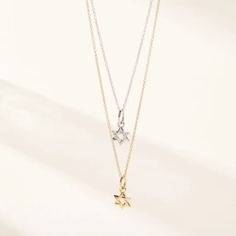 14k Gold Pavé Diamond Star of David Charm sold by Tiny Tags