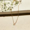 14k Gold Script Initial Nameplate Necklace sold by Tiny Tags