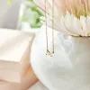 14k Gold Script Initial Nameplate Necklace sold by Tiny Tags
