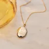 14k Oval Locket Necklace sold by Tiny Tags