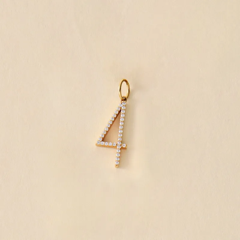 14k Gold Pavé Elongated Number Charm sold by Tiny Tags