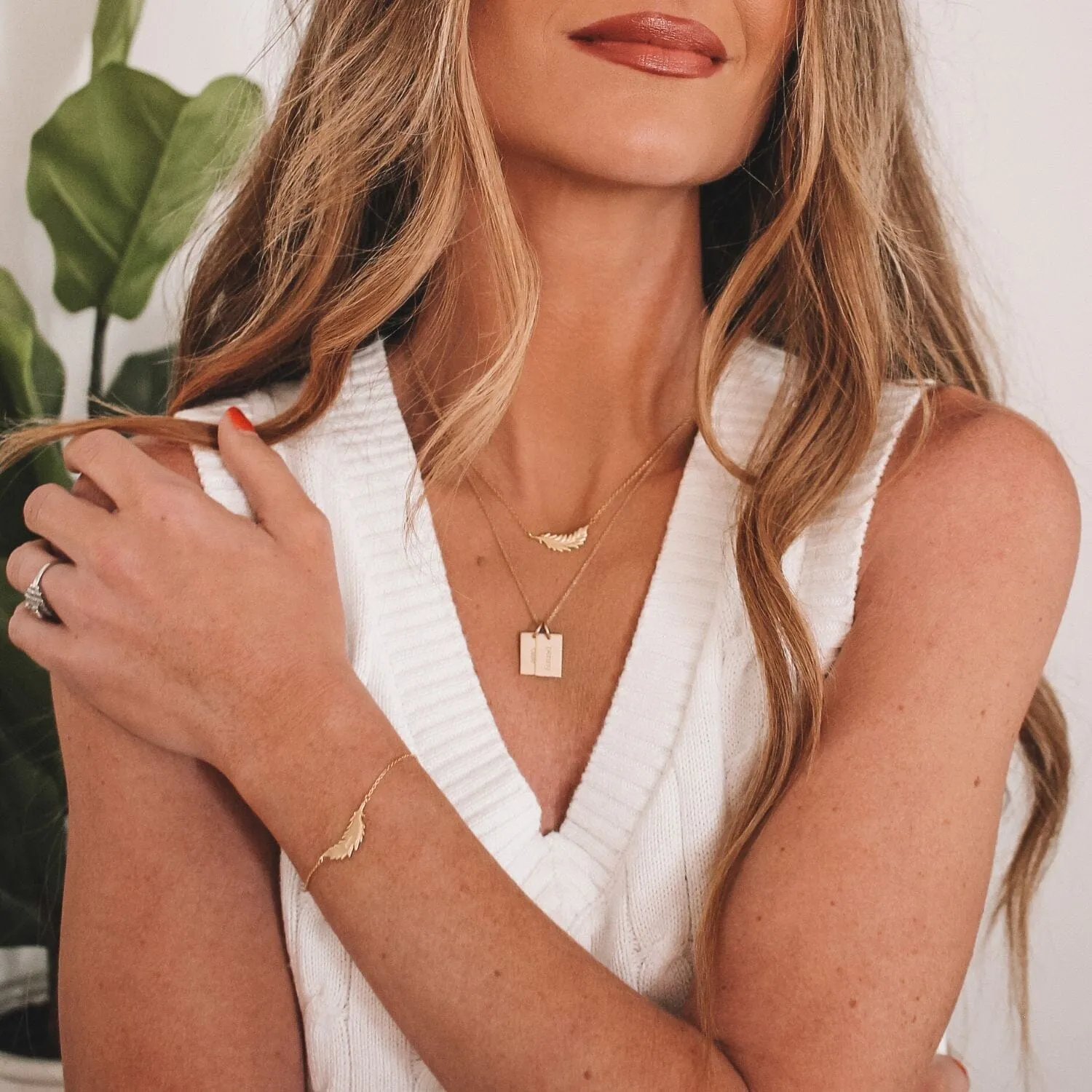 Floating Flamingo Feather Necklace by Lindsey Gurk sold by Tiny Tags product image thumbnail 4