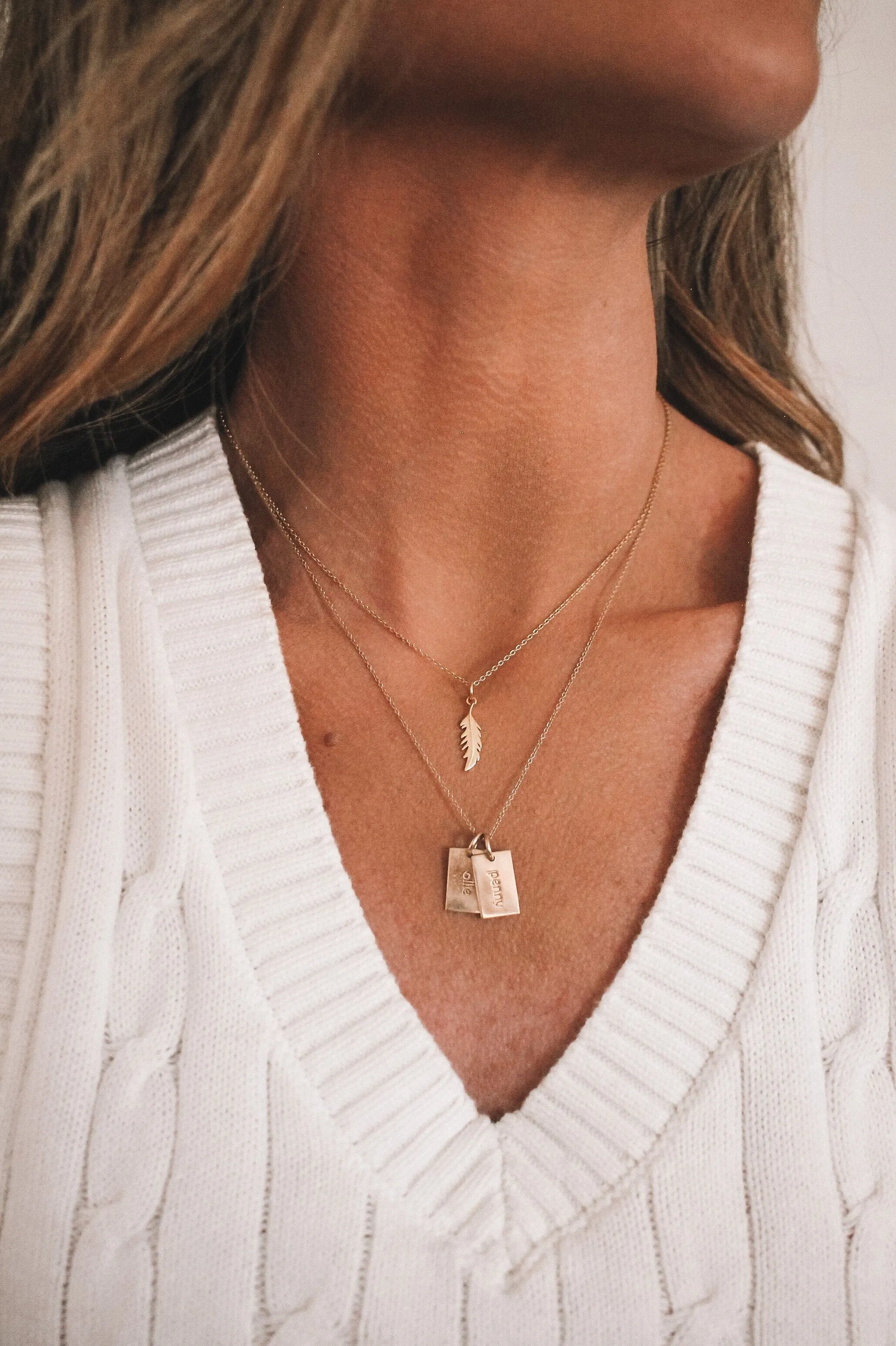 14k Gold Vertical Flamingo Feather Necklace by Lindsey Gurk sold by Tiny Tags product image thumbnail 4