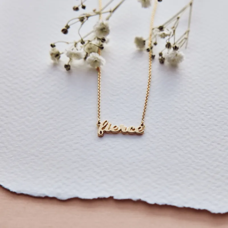 14k Gold Fierce Script Nameplate Necklace sold by Tiny Tags