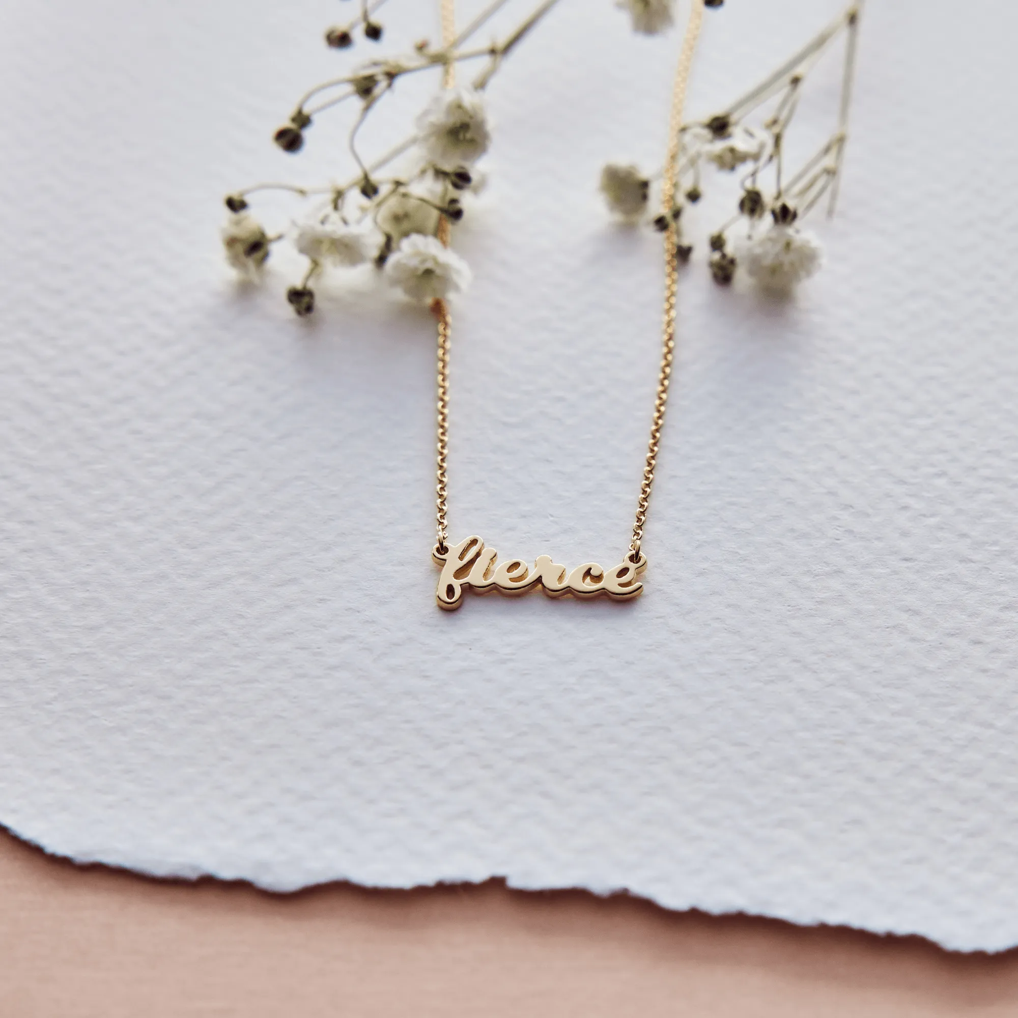 14k Gold Fierce Script Nameplate Necklace sold by Tiny Tags