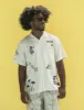 Stamp Buttonup sold by Duvin Design