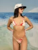 Paradise Top Red sold by Duvin Design