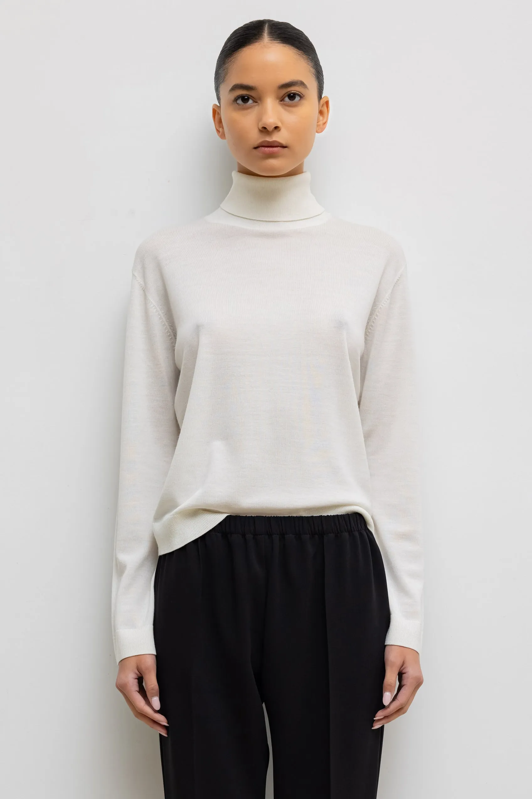 James Turtleneck sold by Leset