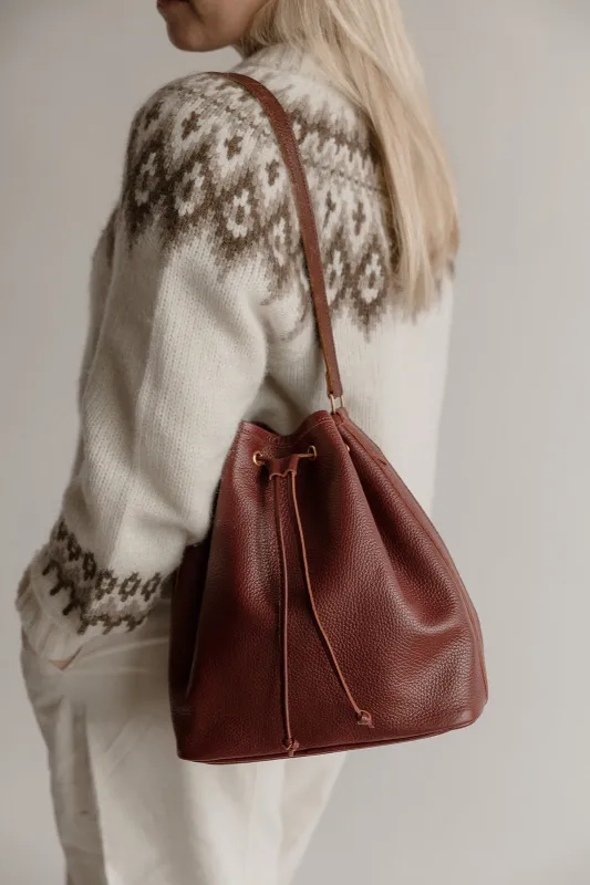 The Everyday Bucket Bag, Bordeaux sold by Abby Alley