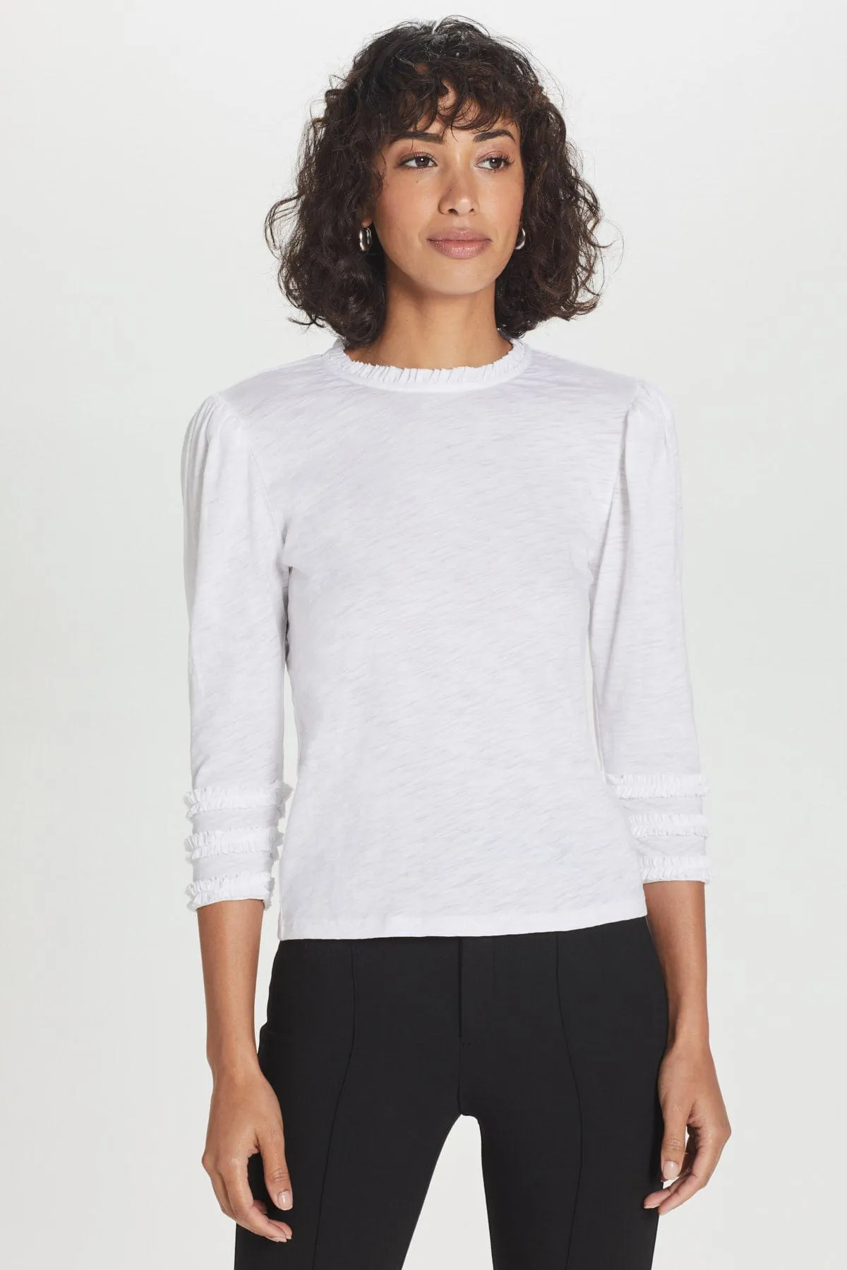 Audrey Ruffle Top sold by Goldie Tees