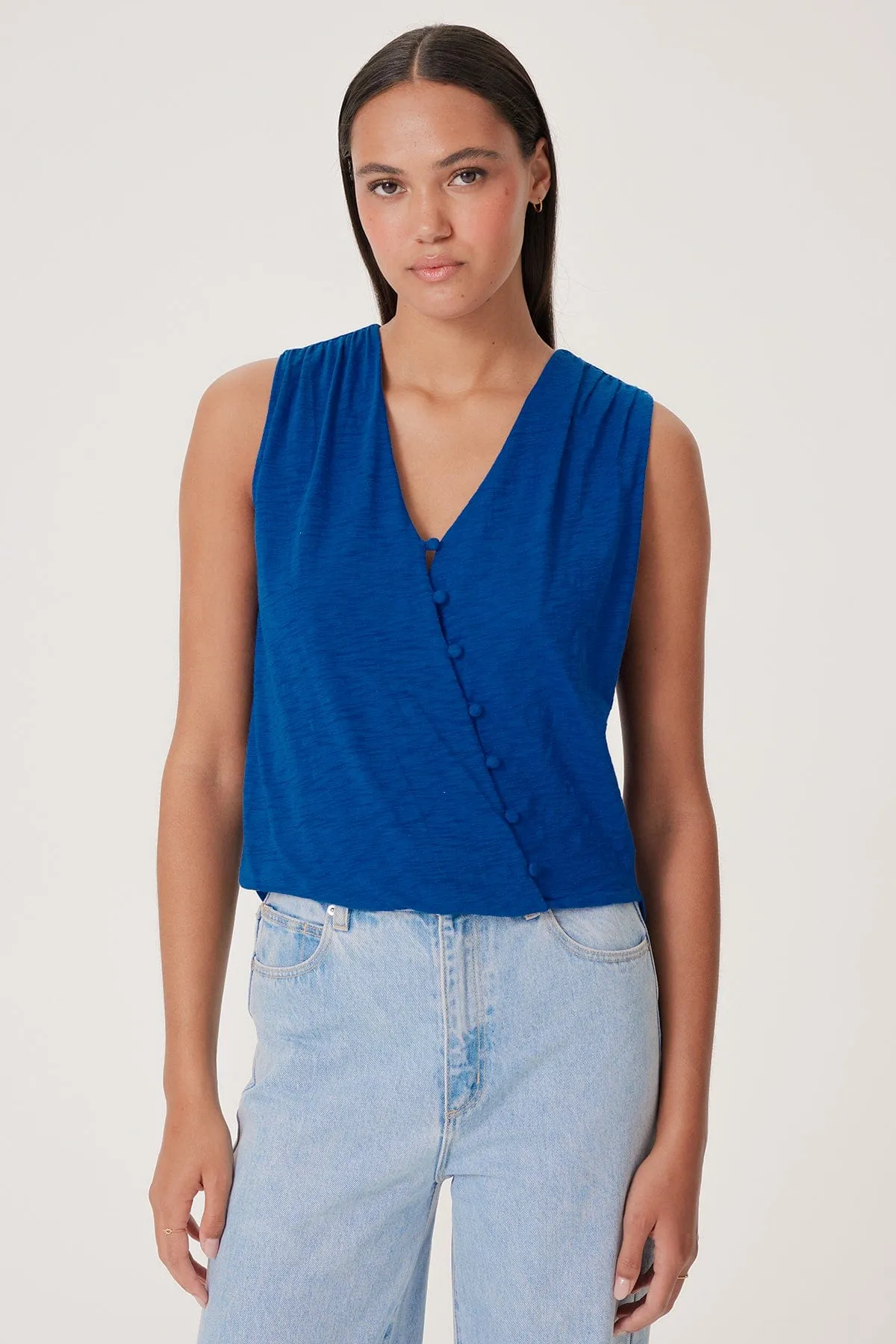 Sabina Surplice Shell sold by Goldie Tees