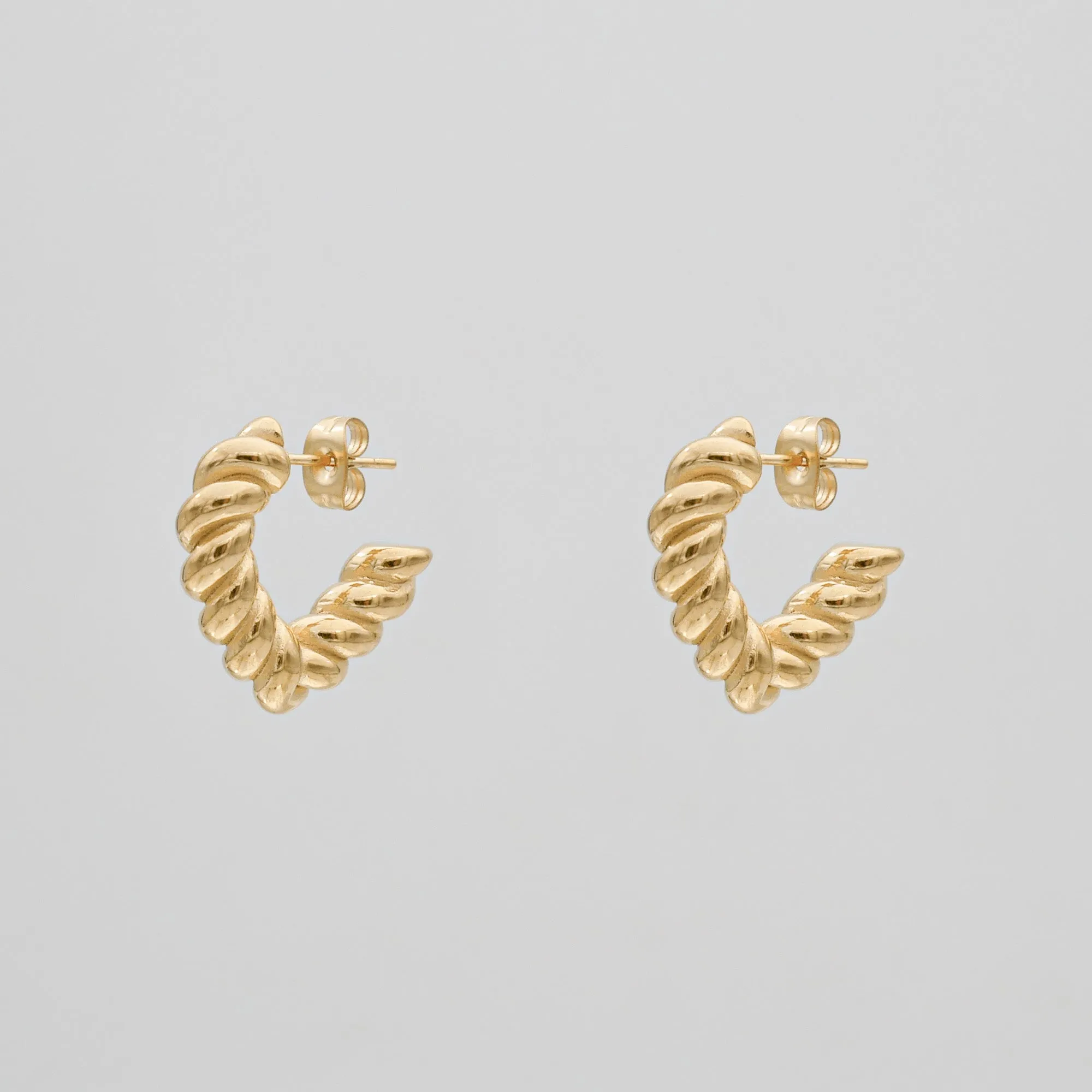 Cara Twisted Earrings sold by PRYA