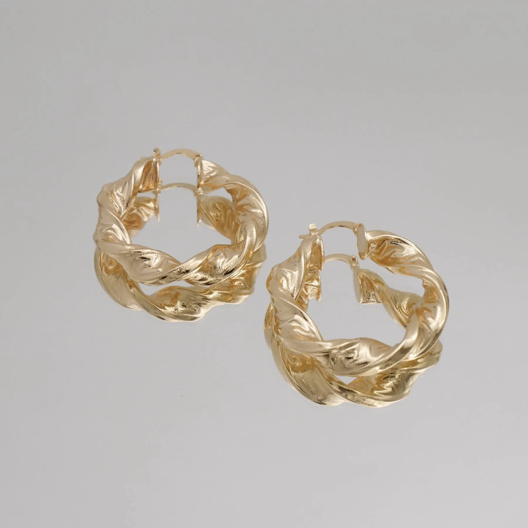 Sofia Thick Twisted Hoops sold by PRYA product image thumbnail 2