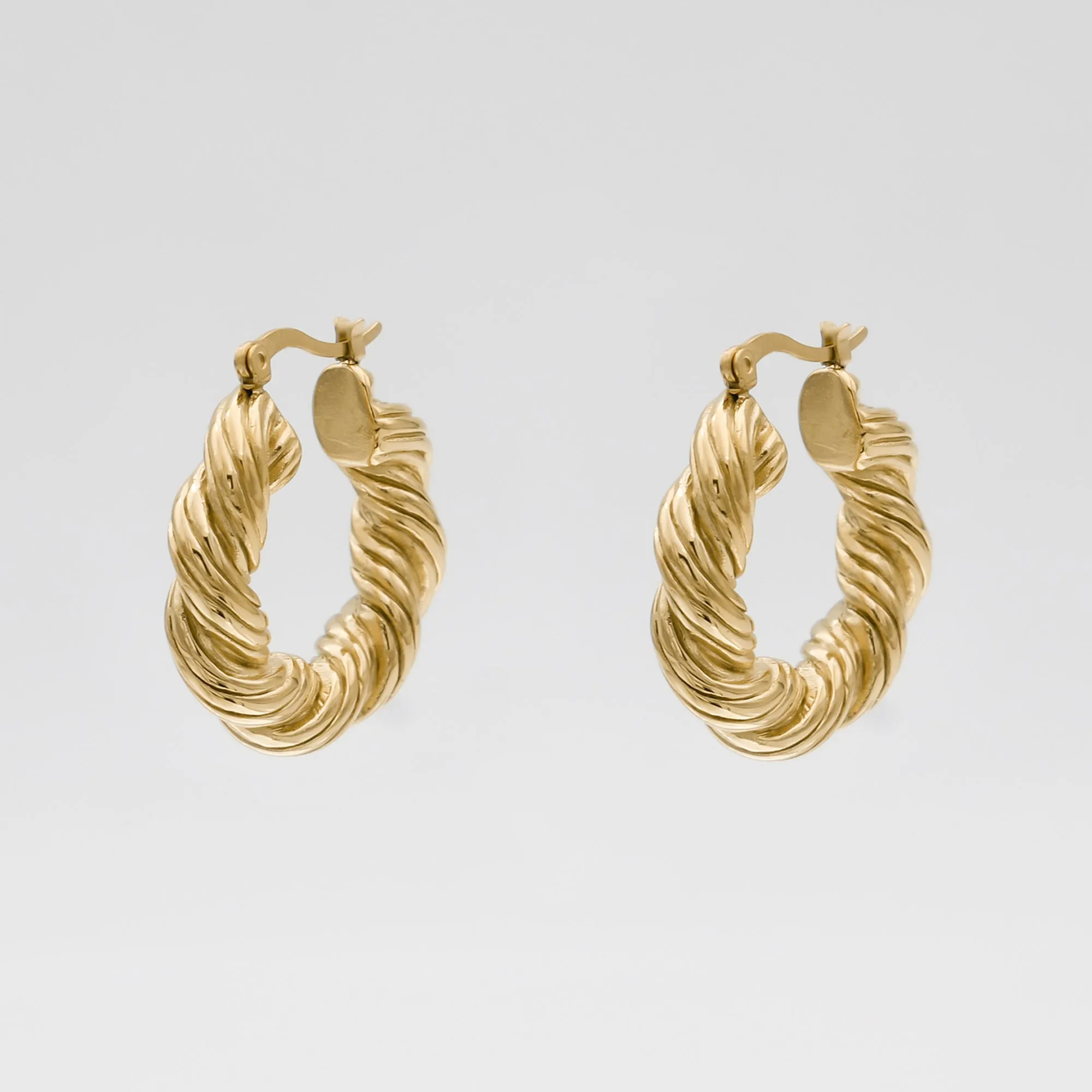 Lucie Twist Earrings sold by PRYA