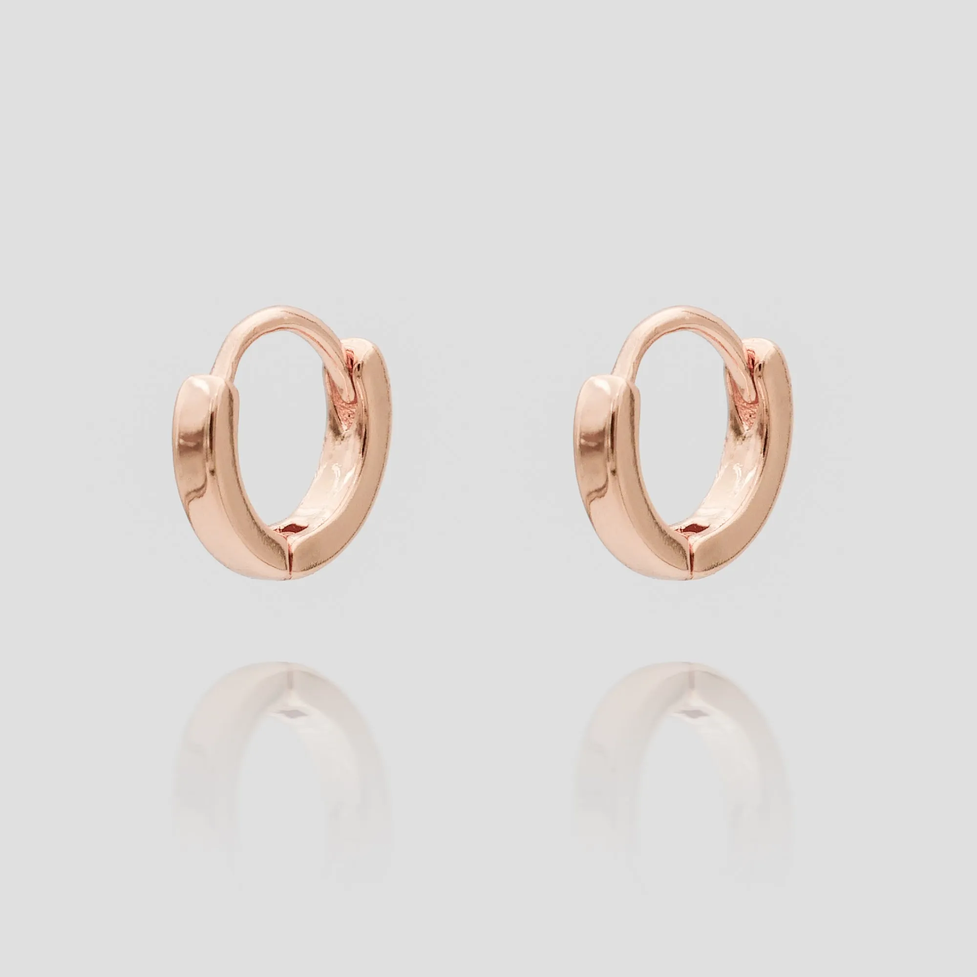 Elle Rose Gold Filled Huggie Earrings sold by PRYA